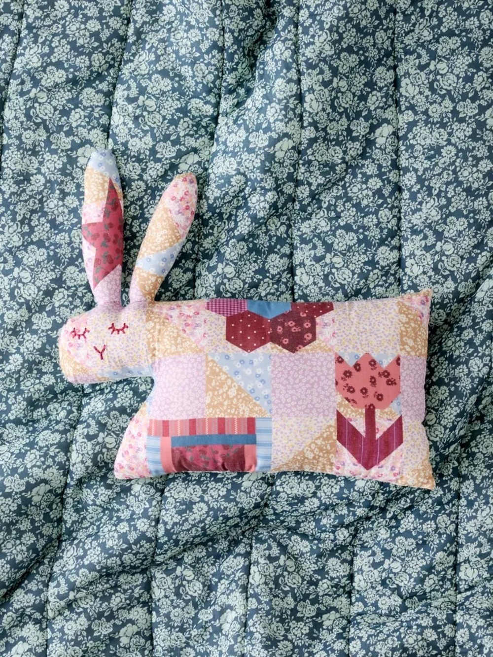 Urban Outfitters Patchwork Bunny Bolster Pillow